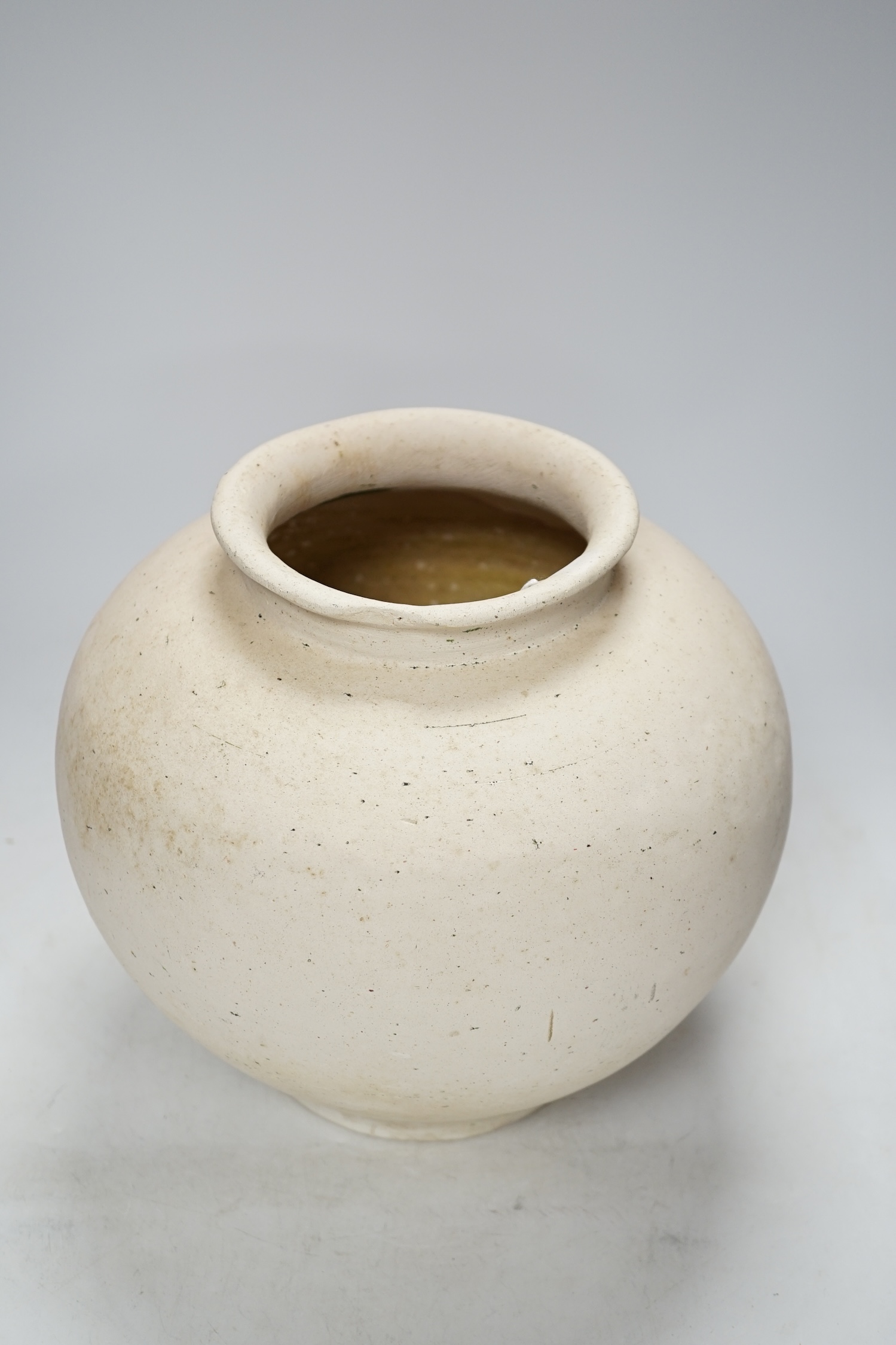 A Chinese pottery ovoid jar, Tang dynasty, 24cm